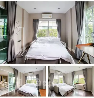 Modern bedroom with large windows and stylish decor