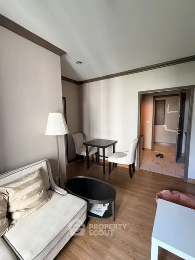 Cozy living room with elegant furniture and wooden flooring