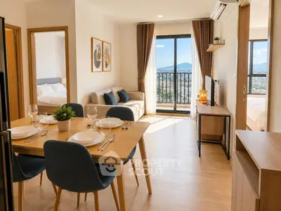 Modern open-plan living room with dining area and balcony view in a stylish apartment.