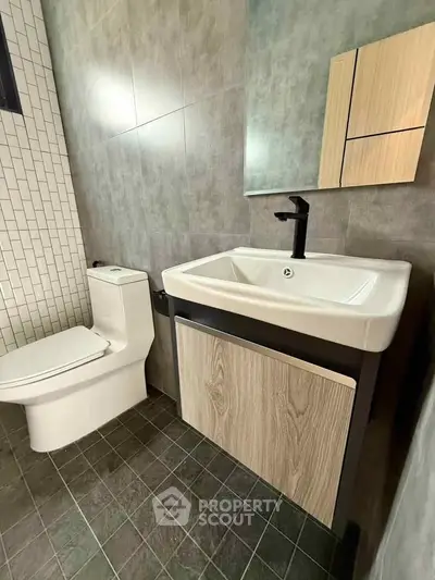 Modern bathroom with sleek fixtures and stylish tile design