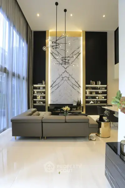 Luxurious modern living room with high ceilings and elegant decor