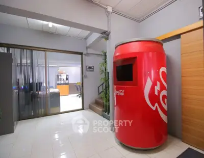 Unique office space with Coca-Cola themed decor and modern interior design