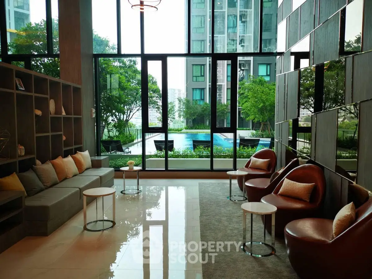 Luxurious modern living room with pool view and elegant decor