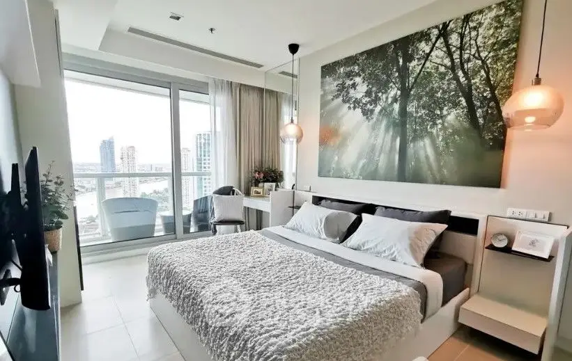 Luxurious modern bedroom with large window and stylish decor