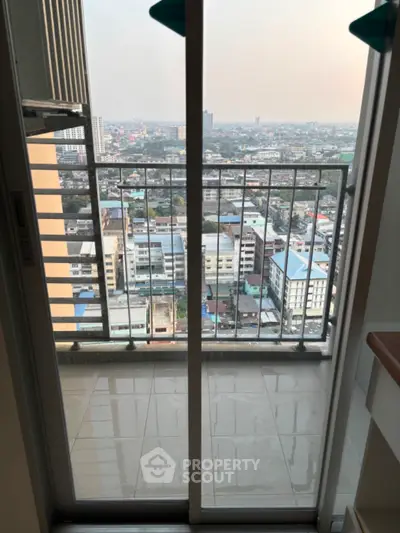 High-rise balcony with stunning cityscape view, perfect for urban living enthusiasts.