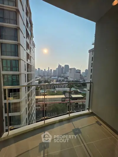 Stunning city view from a modern balcony in a high-rise apartment, perfect for urban living.