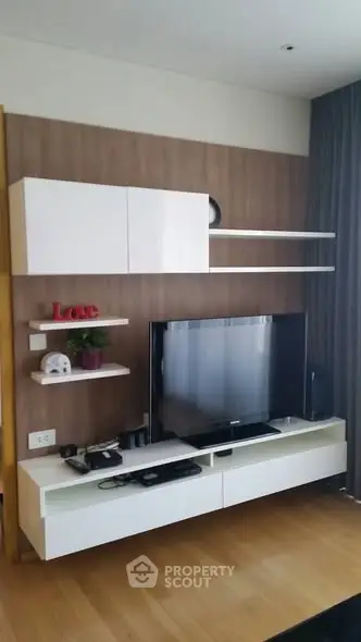 Modern living room with sleek TV unit and stylish decor