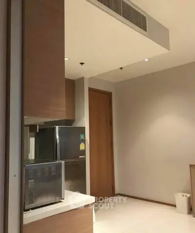 Modern kitchen with sleek appliances and minimalist design