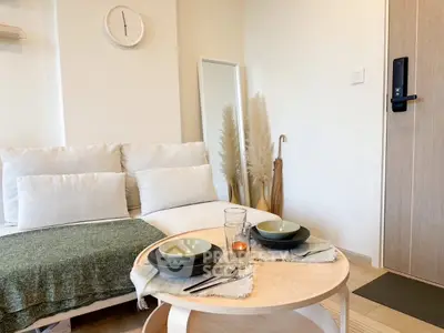 Cozy living room with modern decor and inviting seating area, perfect for relaxation.