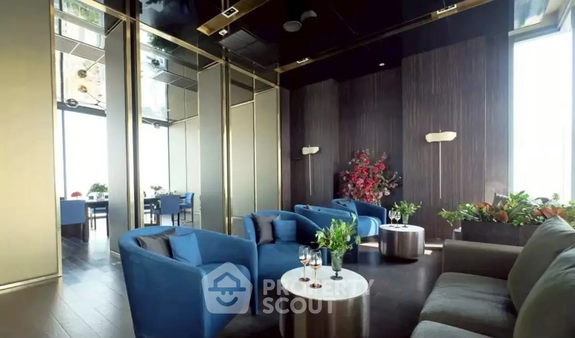 Luxurious modern living room with elegant blue chairs and stylish decor