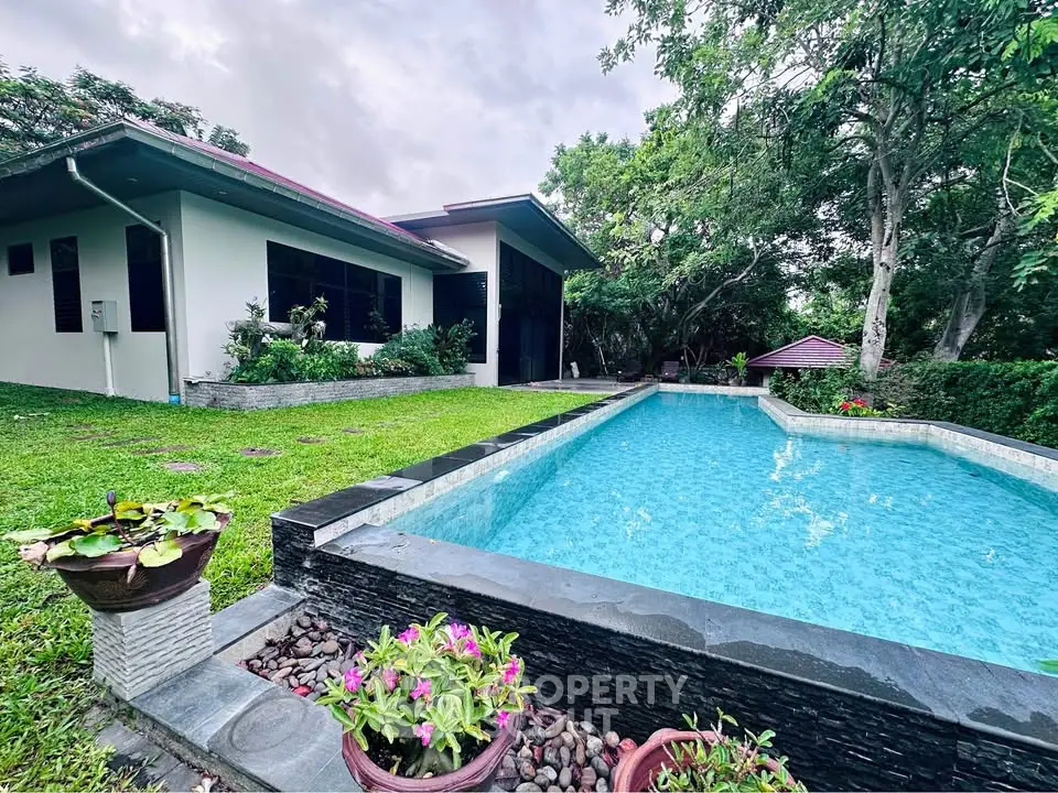 Stunning modern home with private pool and lush garden, perfect for luxury living and relaxation.