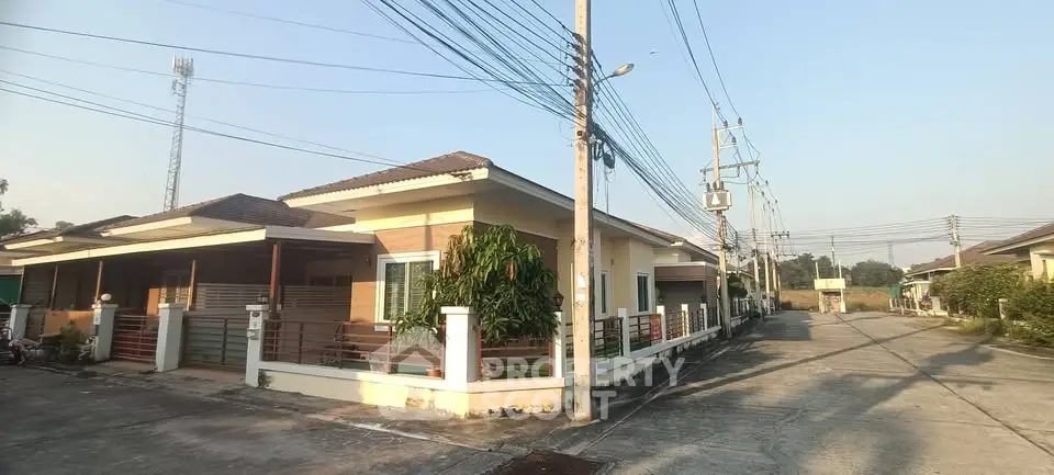 Charming single-story house with fenced yard in a serene neighborhood, perfect for family living.