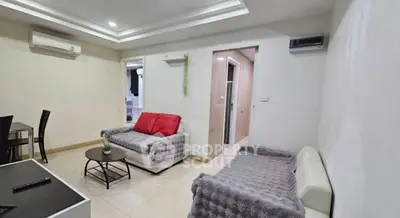 Modern living room with cozy seating and stylish decor