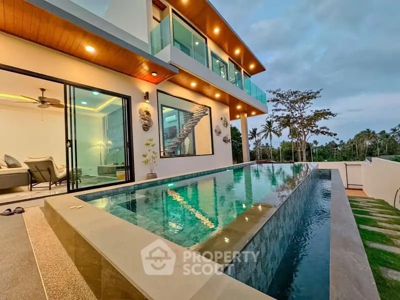 Luxurious modern villa with stunning pool and elegant exterior design.