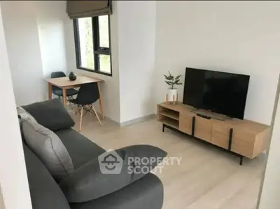 Modern living room with sleek furniture and natural light