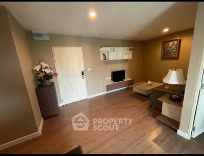 Cozy living room with modern decor and wooden flooring