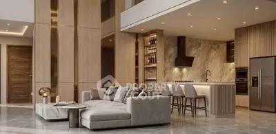 Luxurious open-plan living room with modern kitchen and elegant decor