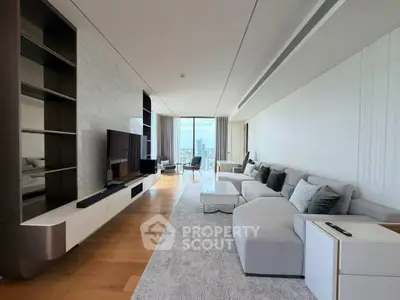 Luxurious modern living room with panoramic city view, elegant furnishings, and spacious layout.