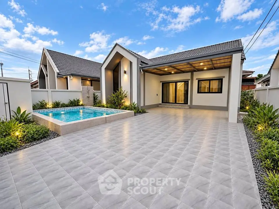 Stunning modern home with pool and spacious patio, perfect for luxury living.