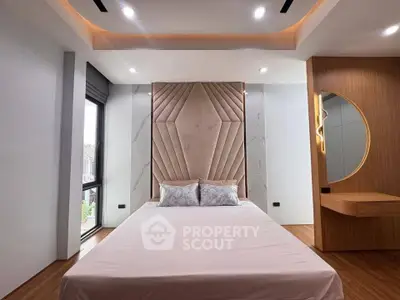 Luxurious modern bedroom with elegant design and large window view