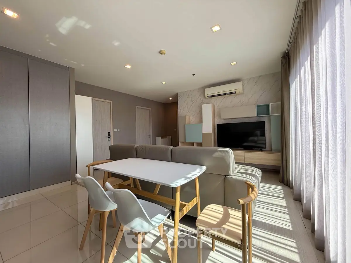 Spacious modern living room with stylish furniture and natural light