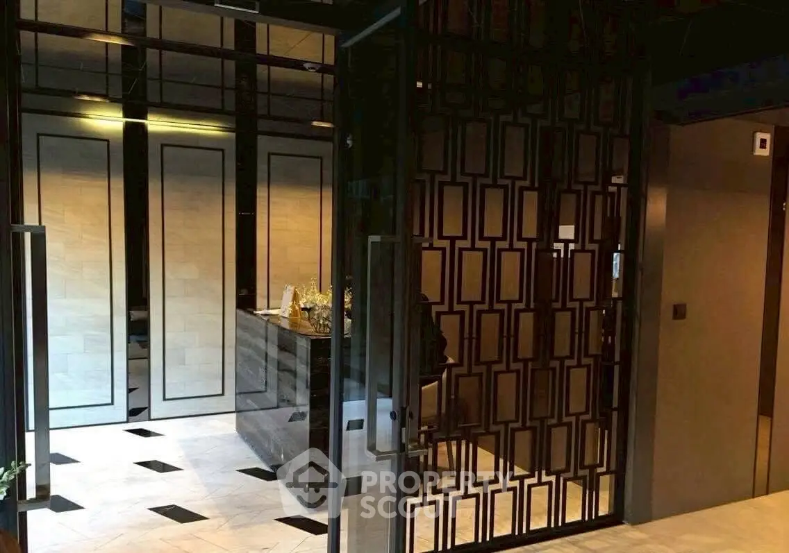 Elegant building entrance with modern design and glass doors
