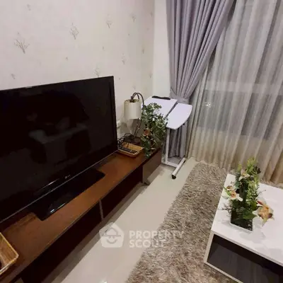 Cozy living room with modern TV setup and elegant decor