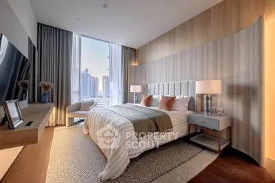 Luxurious modern bedroom with city view, elegant decor, and natural light.