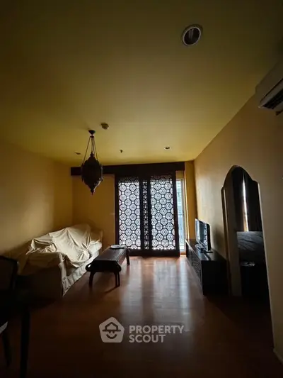 Cozy living room with unique decor and natural light