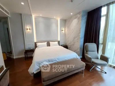 Luxurious bedroom with elegant decor and natural light in modern apartment