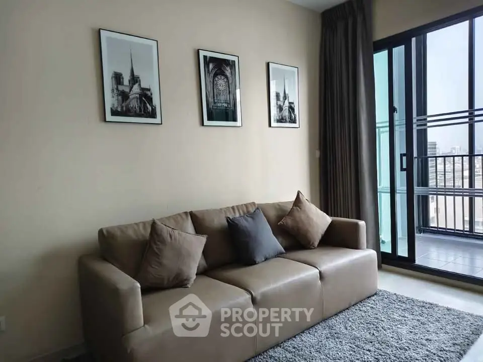 Modern living room with cozy sofa and balcony view