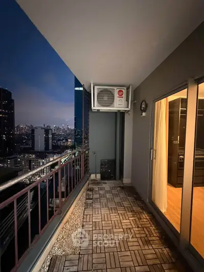 Stunning city view from a high-rise balcony at dusk, perfect for urban living.