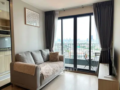 Modern living room with balcony view in high-rise apartment
