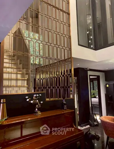 Luxurious modern interior with elegant staircase and stylish decor