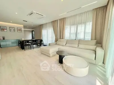 Spacious modern living room with elegant decor and natural light