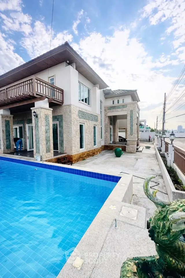 Luxurious villa with private pool and spacious balcony offering stunning views, perfect for upscale living.