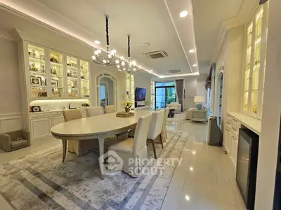 Luxurious dining room with elegant chandelier and spacious seating area