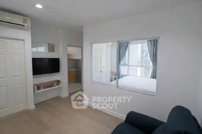Modern apartment interior with bedroom view through glass partition