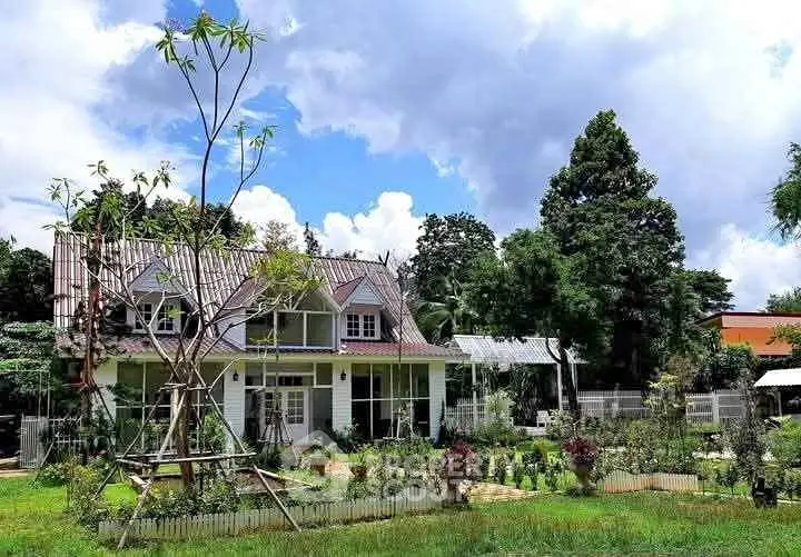 Charming countryside house with lush garden and scenic views