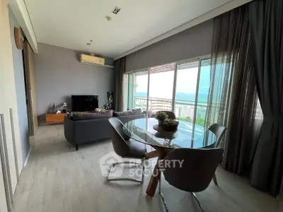 Modern living room with stunning sea view and elegant decor