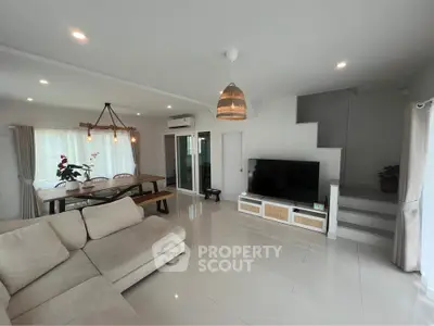 Spacious modern living room with open layout and stylish decor