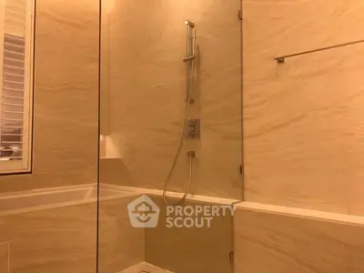 Luxurious bathroom with modern shower and elegant marble design