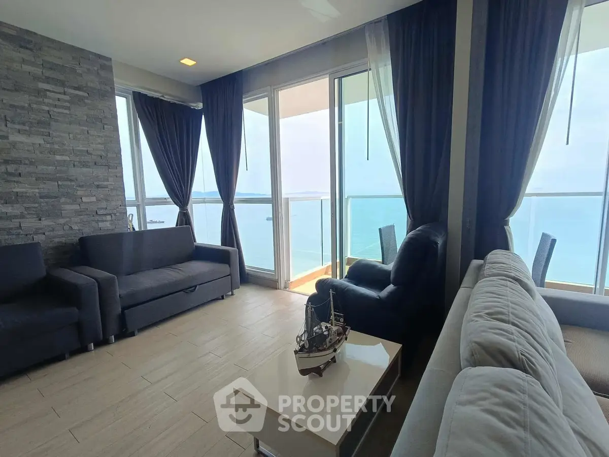 Luxurious living room with stunning ocean view and elegant decor