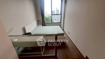 Modern bedroom with city view and sleek design