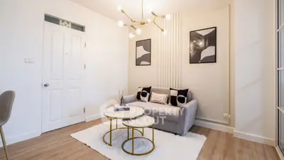 Stylish modern living room with chic decor and elegant lighting