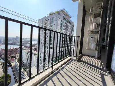 Stunning high-rise balcony with panoramic city views and modern design.