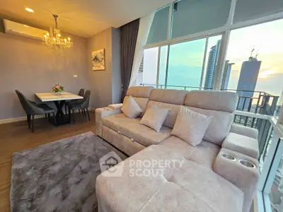 Luxurious high-rise living room with stunning city view and elegant dining area.
