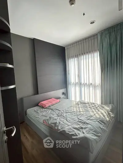 Modern bedroom with natural light and minimalist design