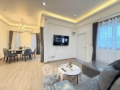 Modern living room with elegant dining area and stylish decor