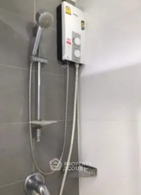 Modern bathroom shower with water heater and sleek design